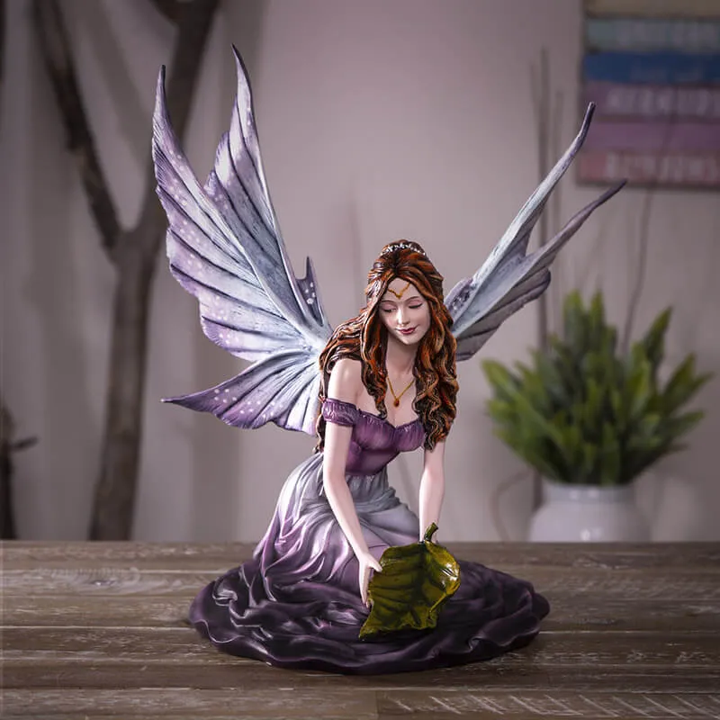 Fairy Playing with a Leaf Figurine